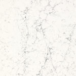 White marble surface with subtle gray veining and natural texture patterns.