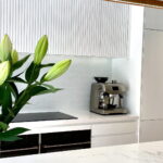 Caesarstone_White Kitchen Benchtop and Splashback_Empira White_Colour 1