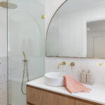 Caesarstone 2141 Snow surface in modern white bathroom