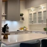 Modern U-shape kitchen with table in Caesarstone 5141 Frosty Carrina 2006
