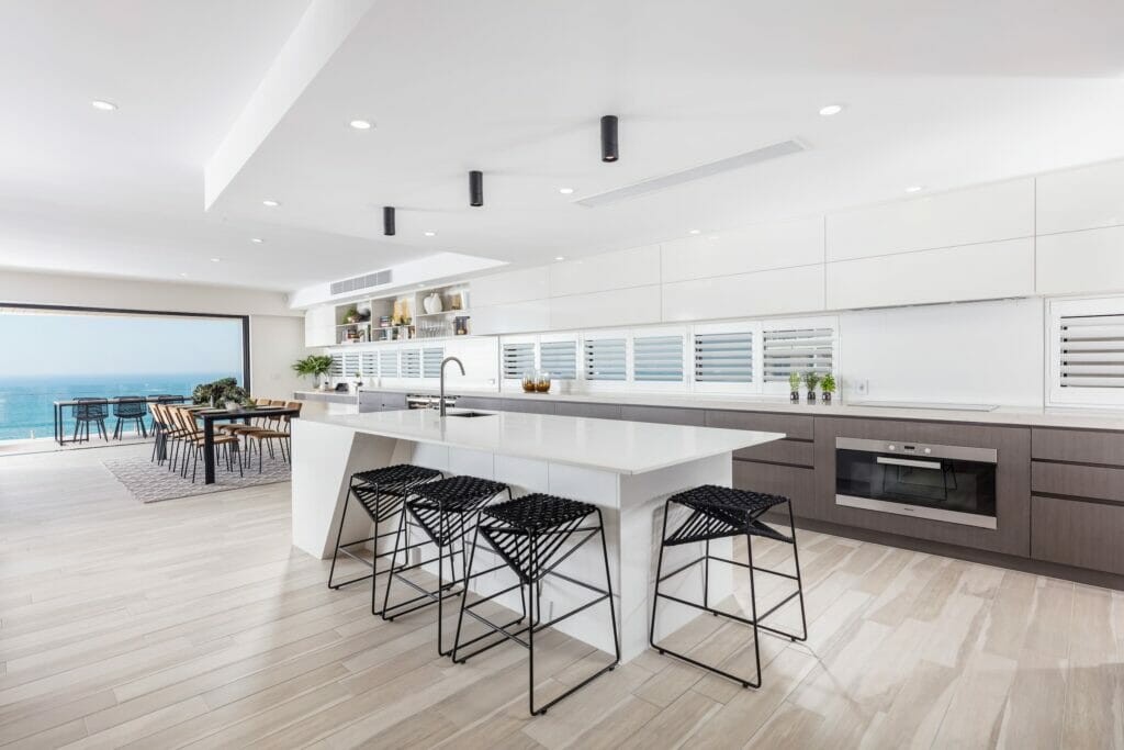 island kitchen design with white caesarstone benchtop and grey cabinets
