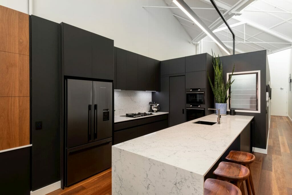 caesarstone peninsula kitchen with white attica benchtop