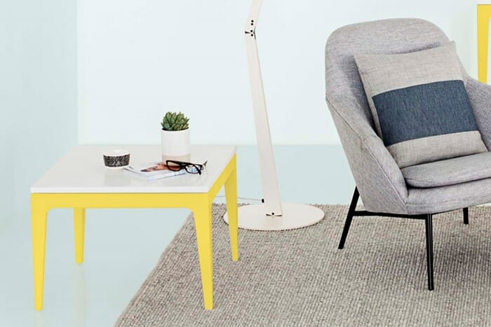 Yellow Urbi furniture with white Caesarstone countertop.