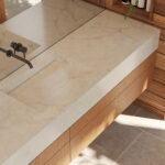 Bathroom vanity in Caesarstone porcelain surface, blending soft veining with warm timber tones for a natural, spa-like retreat.