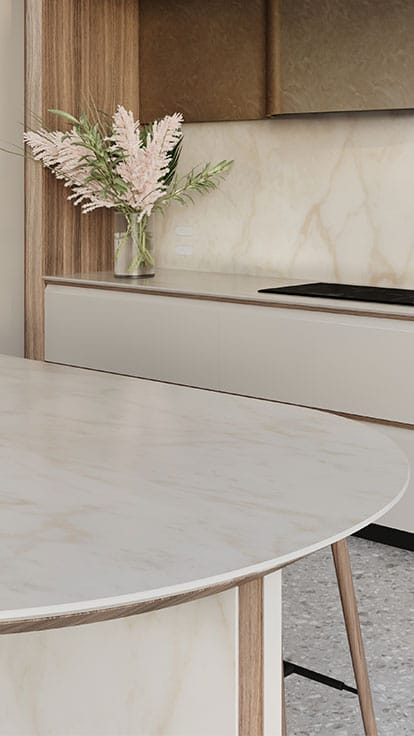 Curved dining room table with Caesarstone Silvax Porcelain surface, thick round table base with dark dining chairs.