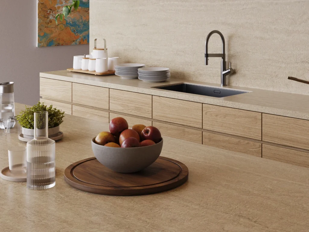 Earthy orange toned splashback and benchtop surfaces, featuring fruit bowl and dinnerware decor.
