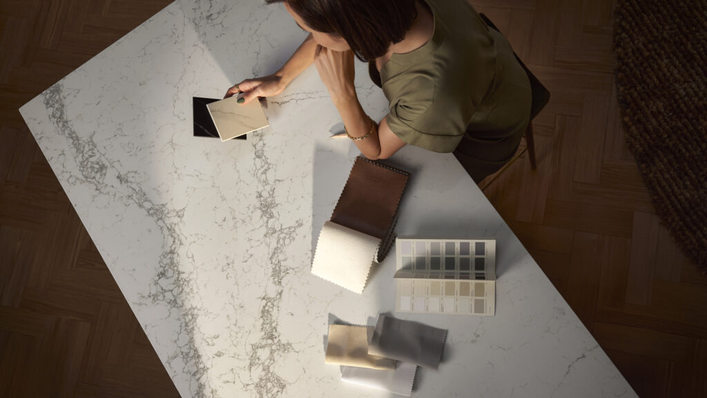 Design flatlay showcasing Caesarstone with complementary materials for cabinetry, flooring, and splashback inspiration.