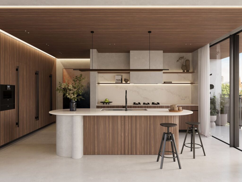 Modern kitchen featuring Caesarstone<sup>®</sup> benchtop with integrated Pitt Cooking burners and timber cabinetry.