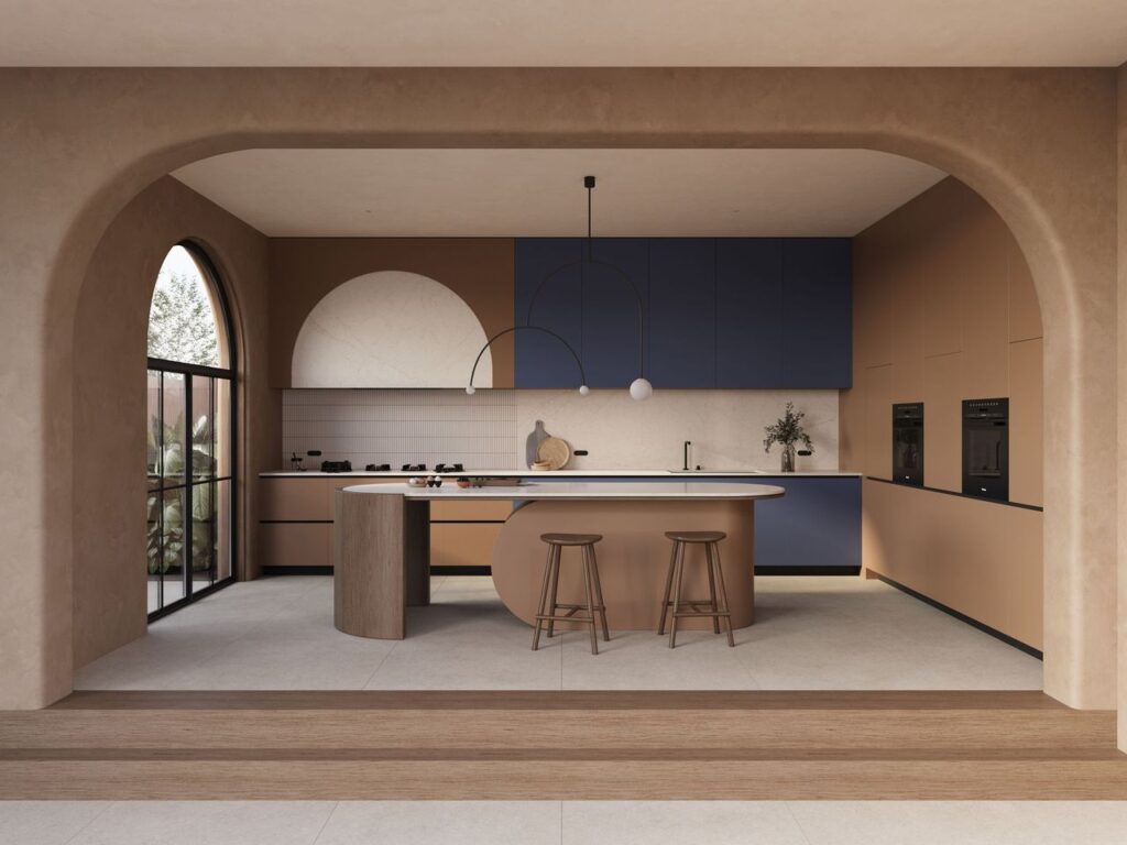 Modern arched kitchen with Caesarstone<sup>®</sup> benchtop, curved island, bold blue cabinetry, and integrated Pitt Cooking burners.