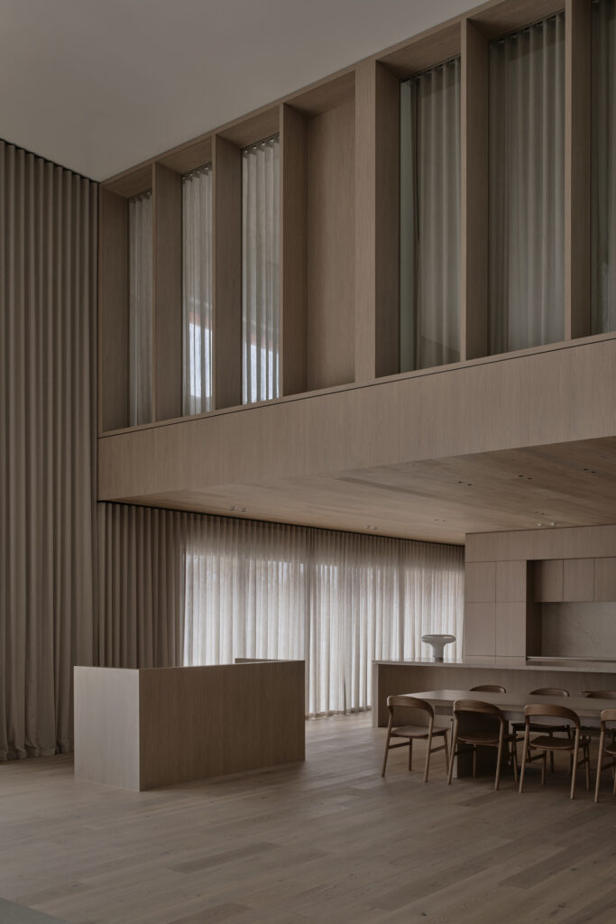 Double-height interior of Caesarstone’s Adelaide flagship showroom in Wingfield featuring timber architecture and collaborative design spaces.