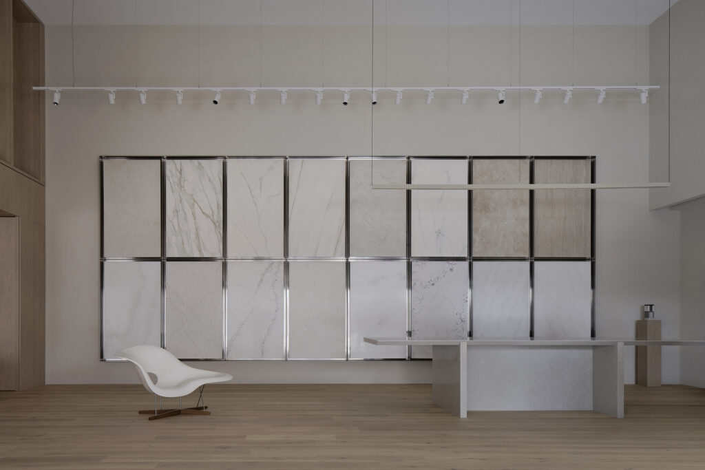 Interior of Caesarstone’s Wingfield flagship showroom in Adelaide featuring large-format mineral and porcelain surface slabs in a light-filled architectural space.
