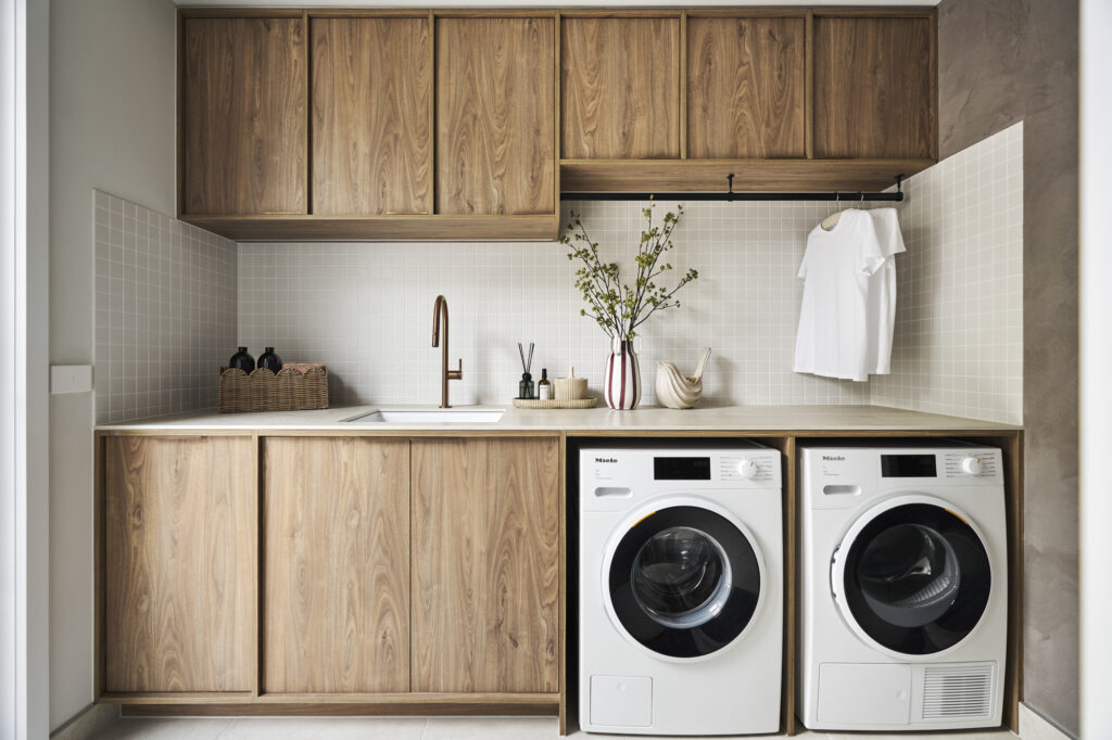 Close-up of Silvax Porcelain vanity surface showing silver-grey banding and stone finish texture