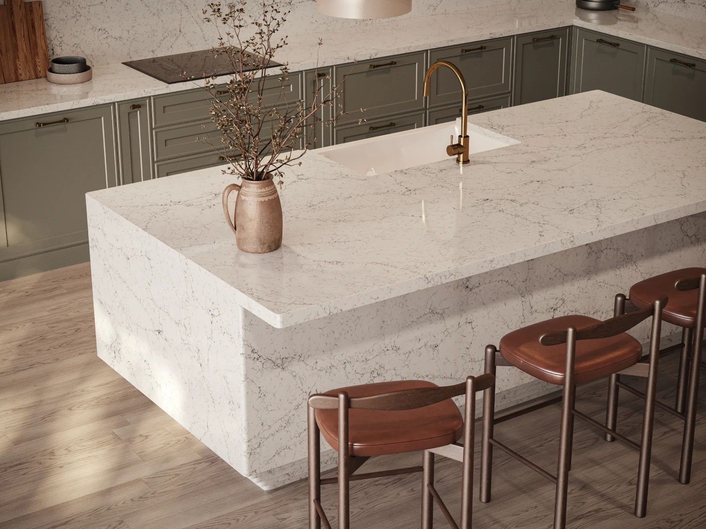 Contemporary kitchen island in Caesarstone<sup>®</sup> White Attica with waterfall edges, paired with sage cabinetry and timber stools