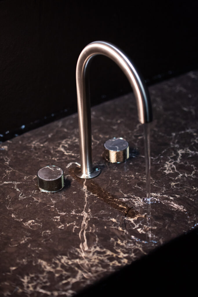 A study in form and finish—where water flow becomes a tactile design element.