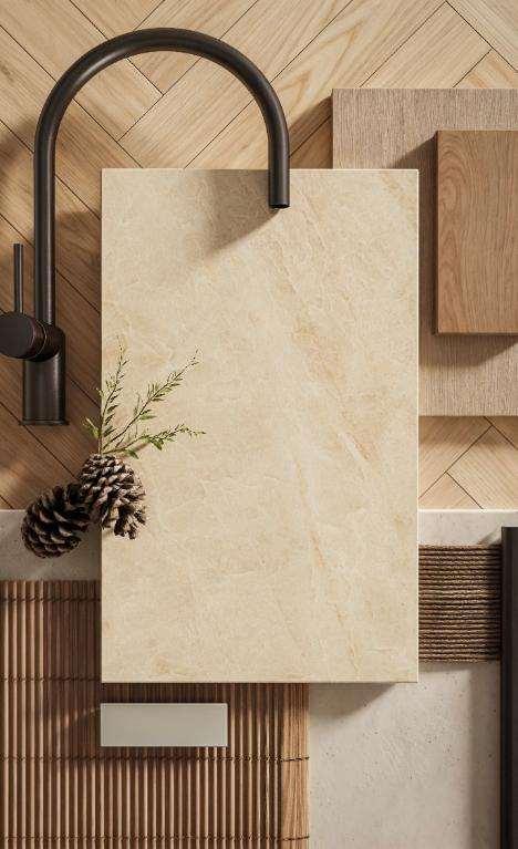 Caesarstone<sup>®</sup> Opal Taj™ 584 porcelain surface swatch on design mood board with herringbone timber, slatted joinery and black tapware
