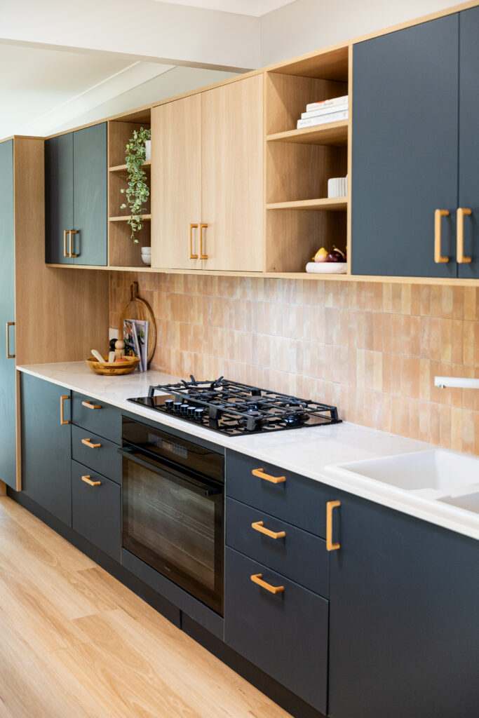 Loftus NSW galley kitchen featuring Caesarstone<sup>®</sup> ICON™ Rossa Nova island benchtop