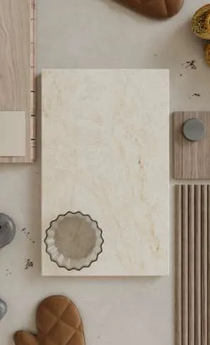 Caesarstone<sup>®</sup> Taj Whisper™ 8251 ICON Mineral surface swatch on design mood board with timber and ceramic samples