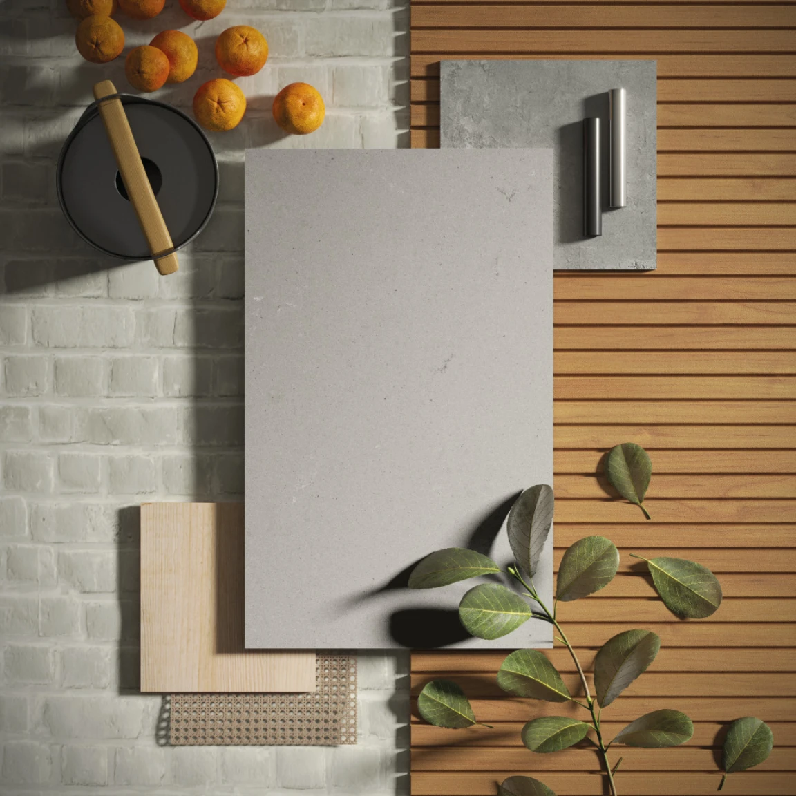 Styled flat lay in an earthy, textural palette, pairing a Caesarstone<sup>®</sup> Raw Concrete sample with timber slats and terracotta tones.