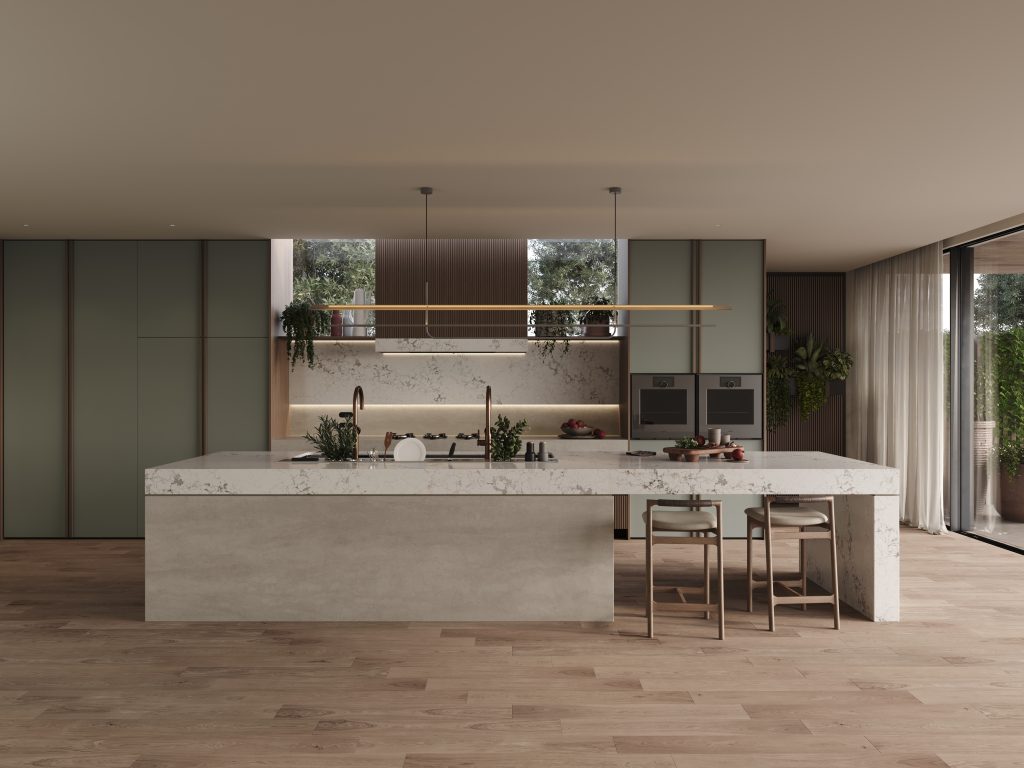 Grand luxury kitchen with a Caesarstone<sup>®</sup> Calacatta Dreamwave waterfall island benchtop, Aluminous details, and muted green cabinetry by Studio Minosa.